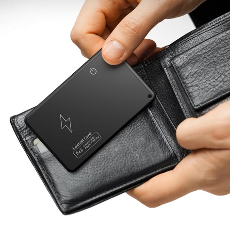 A smartphone displaying a map with two credit cards on top.